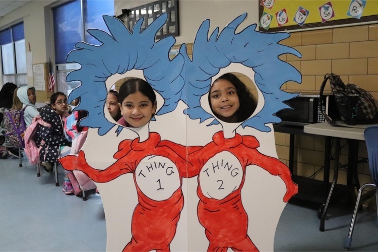 PHES students with Thing 1 and Thing 2 cutout  