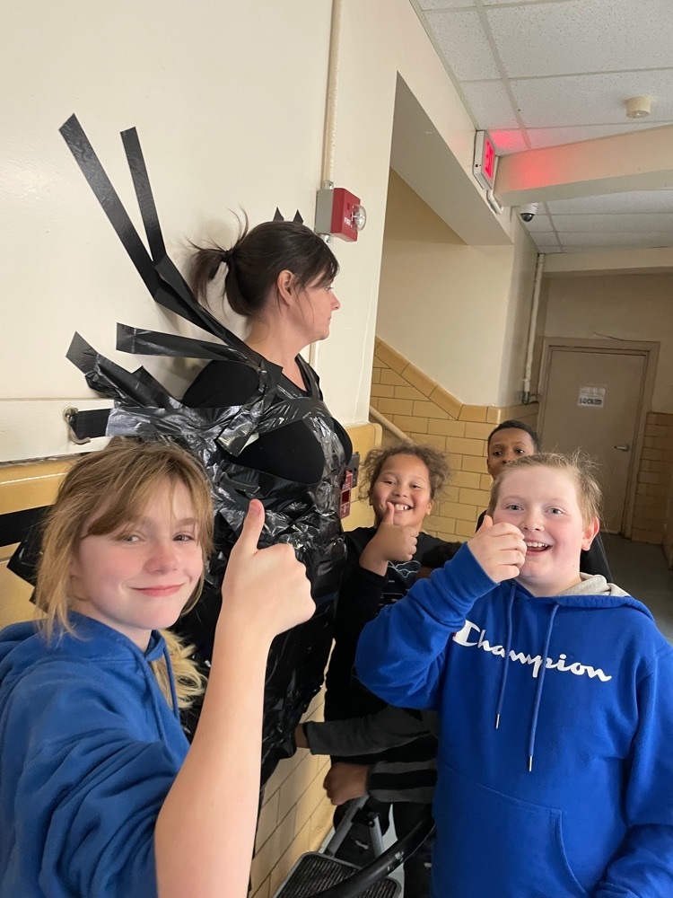 PHES Principal Cameron Cooper is duct taped to a wall