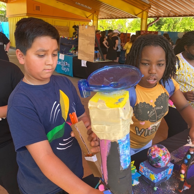 Elementary students work with their class-made roller coaster at King’s Dominion