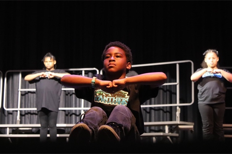 A member of the PHES step team performs at the spring concert