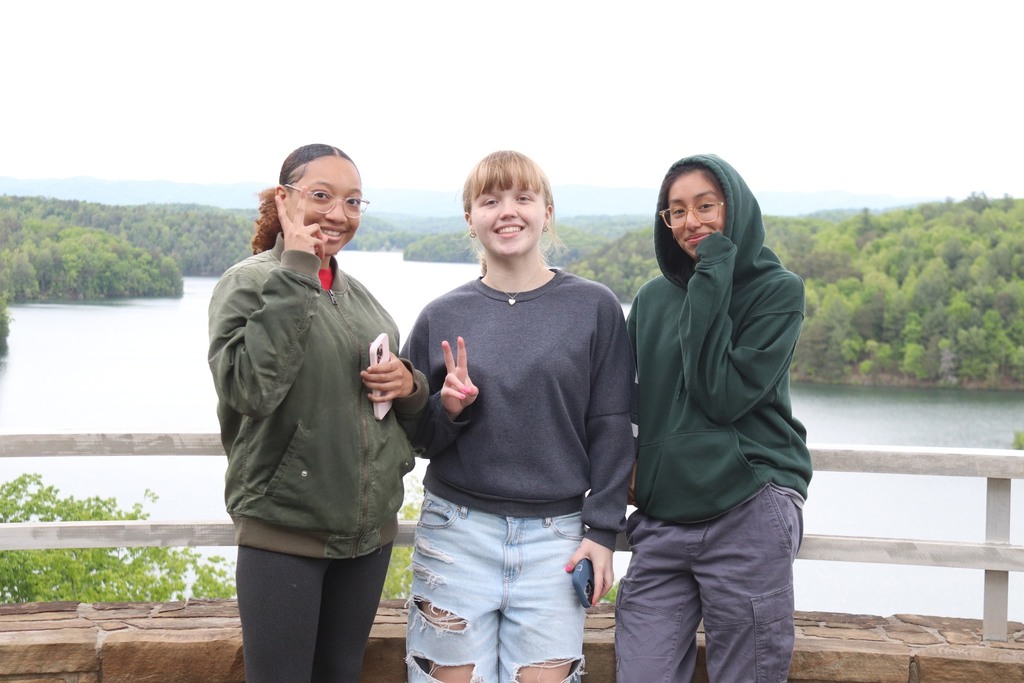 Three high school students pose at the Philpott Lake overlook
