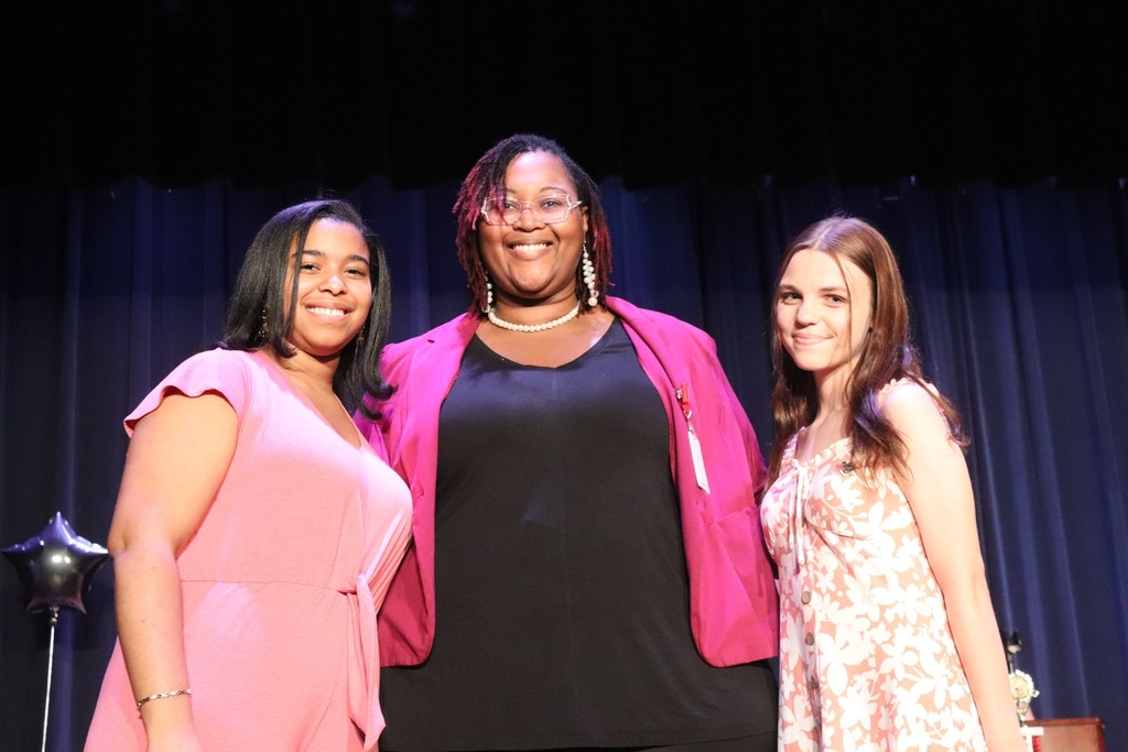 Performing Arts Academy director with two MMS students
