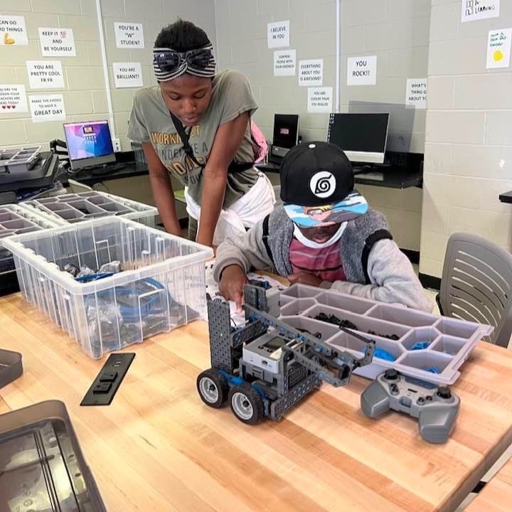 Students work on building a robot