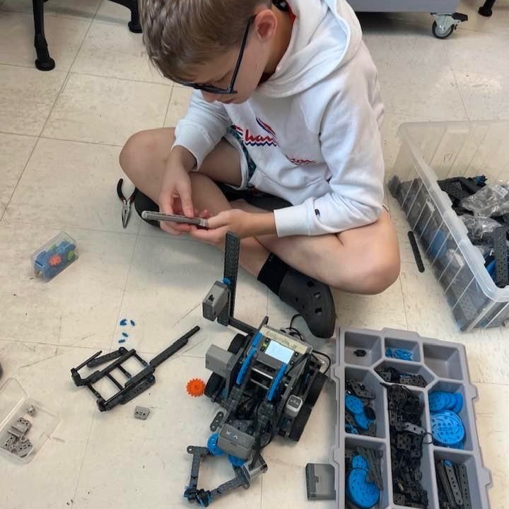 a student builds a robot