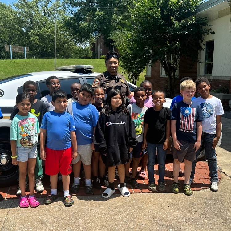 PHES students pose with Sgt. Anitra Huff